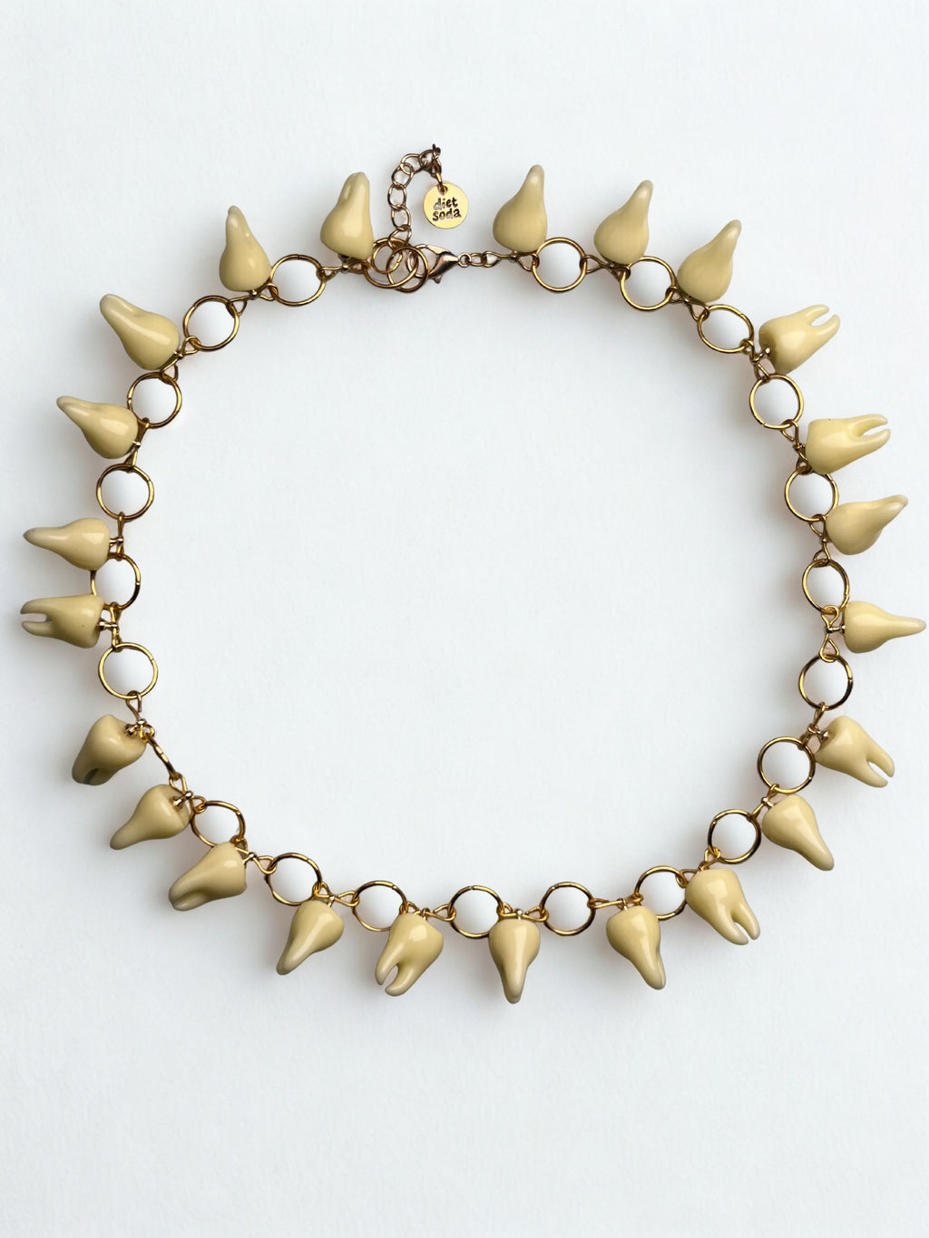 she bites necklace