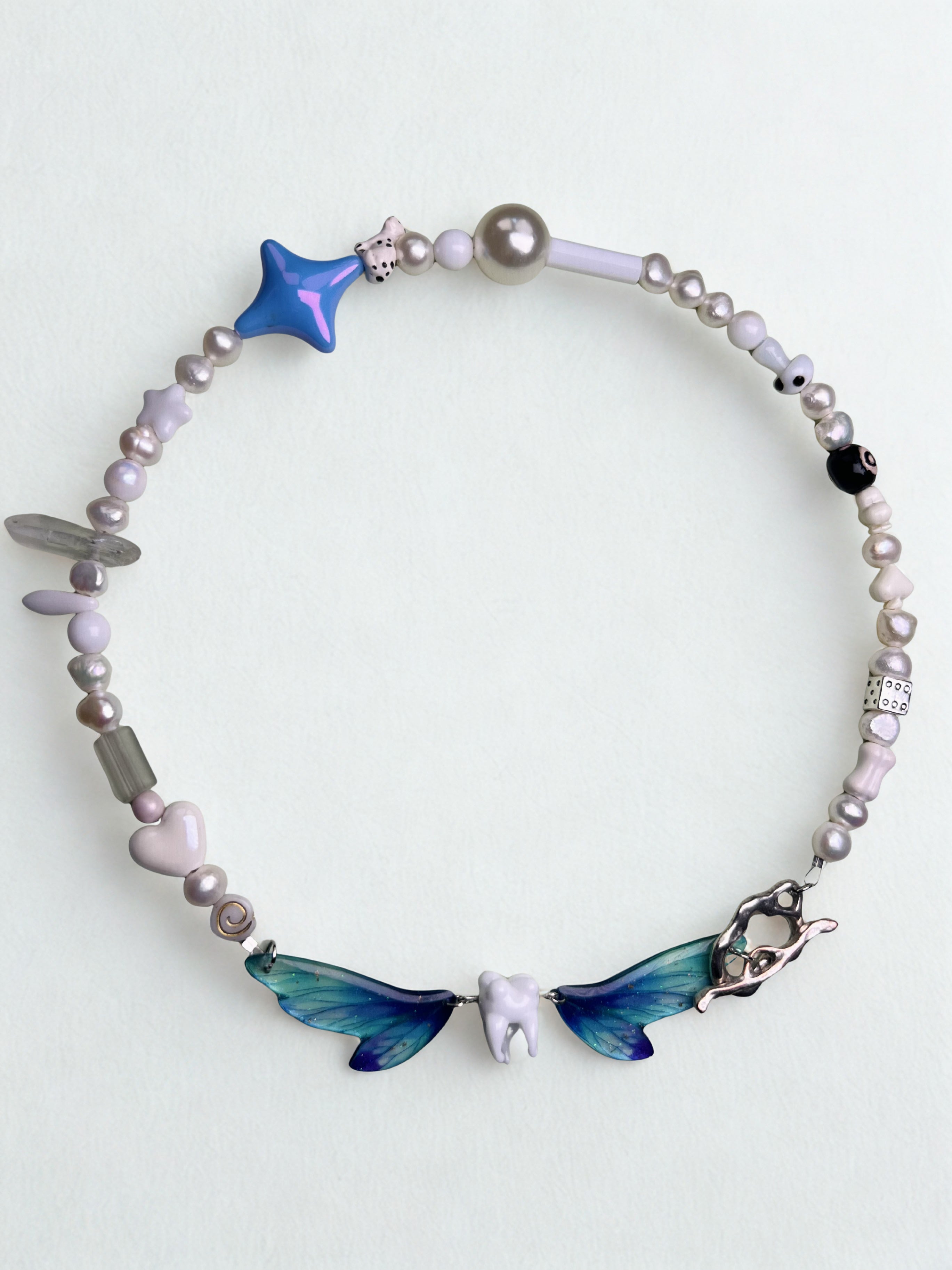 winged thing necklace